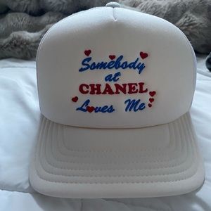 Mega Yacht Somebody at Chanel Loves me hat